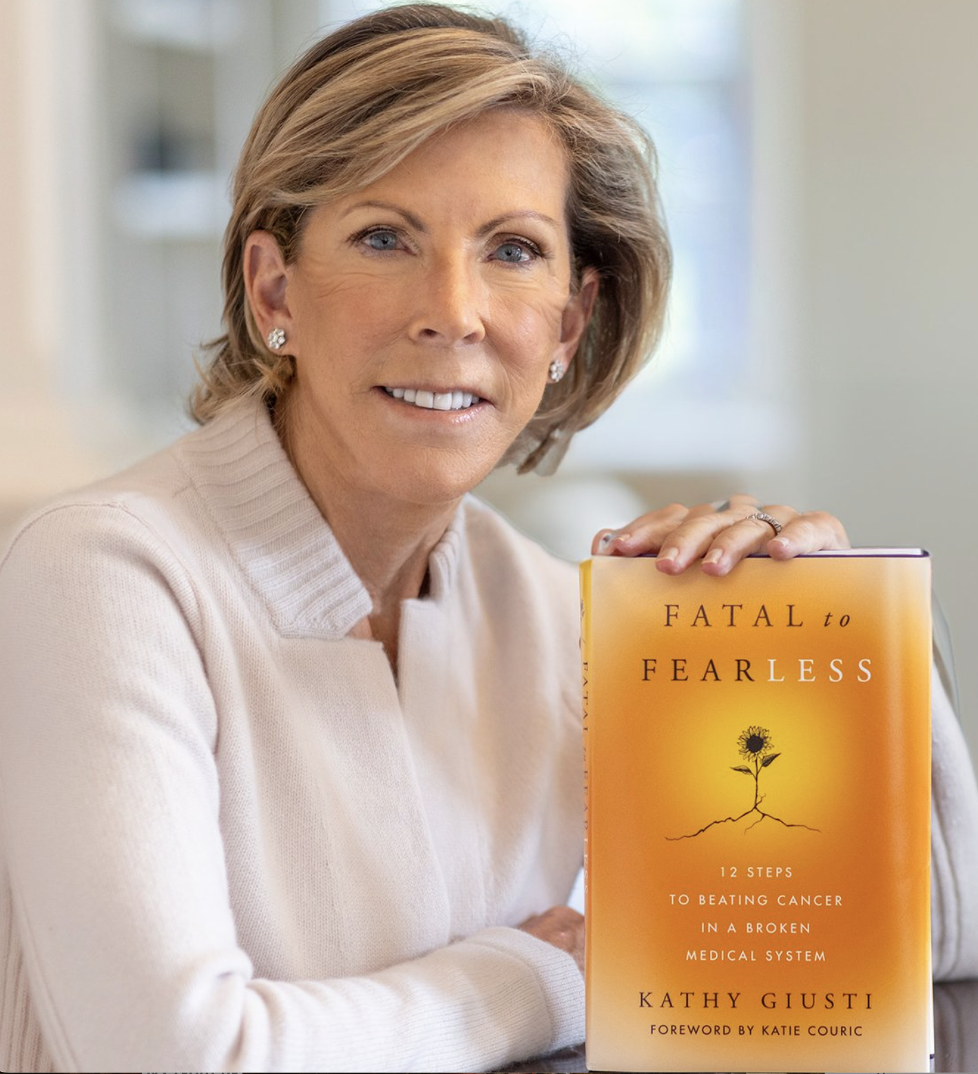 Kathy G holding Fatal to Fearless