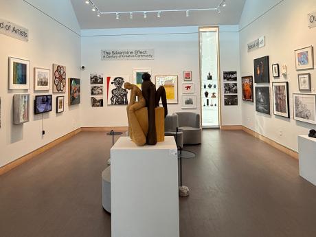 View of gallery with artwork in it