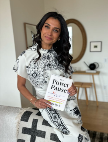 Neha Ruch holding her book