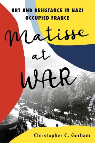red white, yellow & blue cover with inbedded blk & white photograph of nazi soldiers marching a long a road