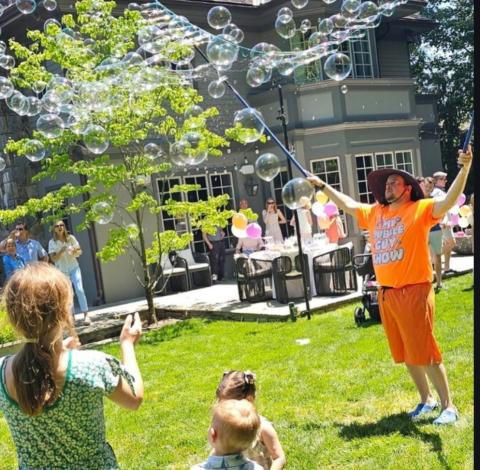 Guy doing bubble show