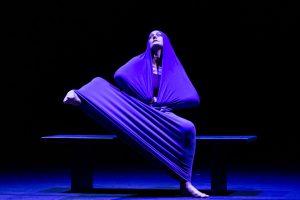 dancer in fabric stretching