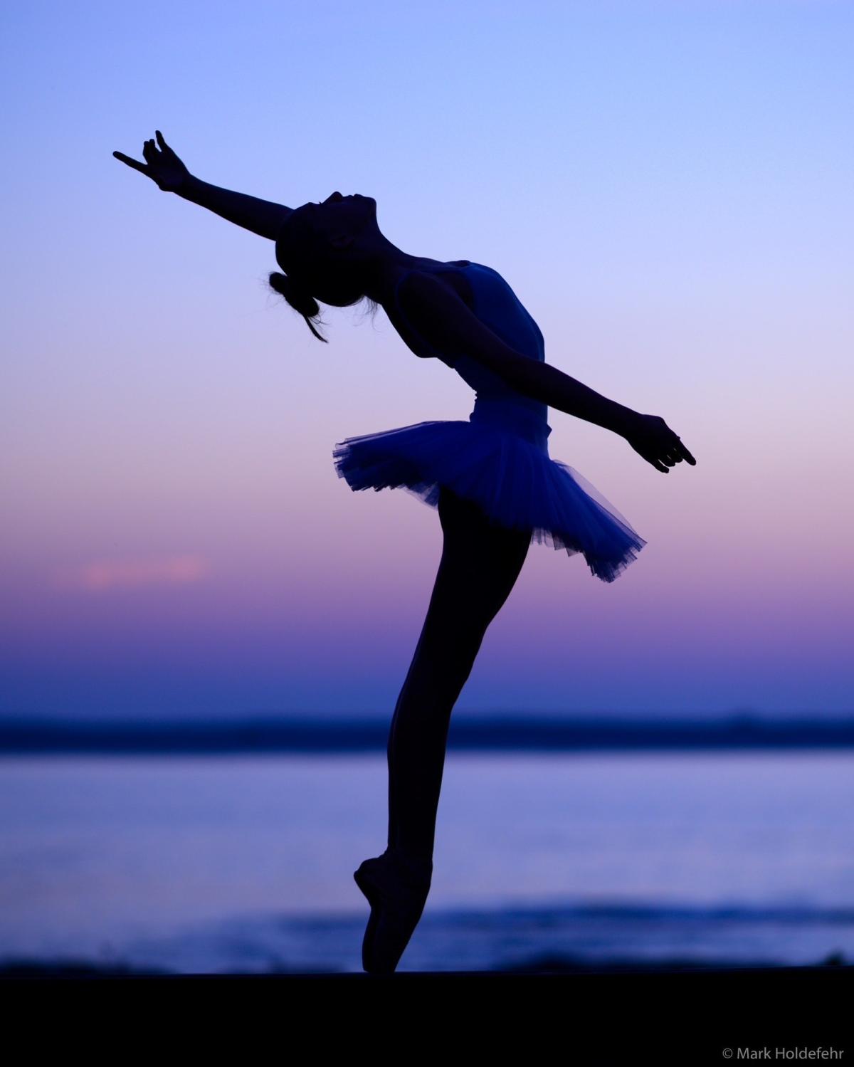 Dancer in front of water
