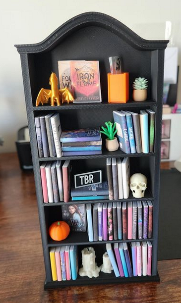 Photograph of handmade miniature bookshelf. 